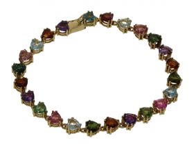 18k gouden tennisarmband met edelsteen toermalijn topaas amethist granaat spinel