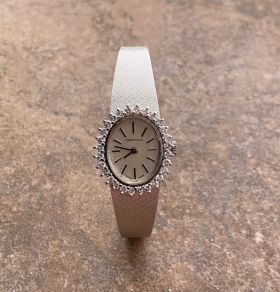 14 karaats gouden Certina dames pols horloge met 28 diamanten