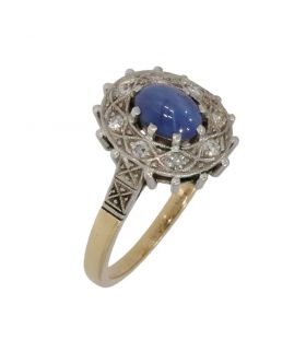 Ster saffier 14 karaats gouden ring met 8 diamanten