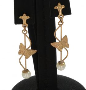 Gouden set vintage oorbellen met vlinder en parel