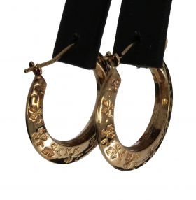 Gouden set vintage creolen bewerkt bloem motief