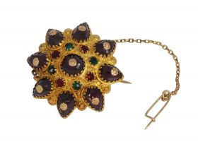 Friesland 14k gouden ster broche granaat en groen glas ca. 1900