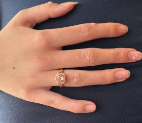 Rosegouden ring met 17 diamanten en hartvormige zirkonia