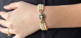 Parel armband 3-strengs fraai 18k gouden roosdiamant slot