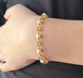 Design 14 karaats gouden dames armband met parels 19cm