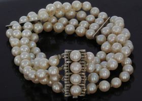 4-stregens zoetwater parel armband met fraai 14k gouden slot en tussenstukken