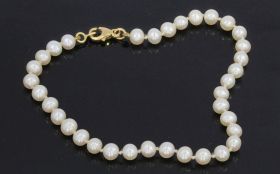 Parel vintage armband 14k gouden karabijn slot dames