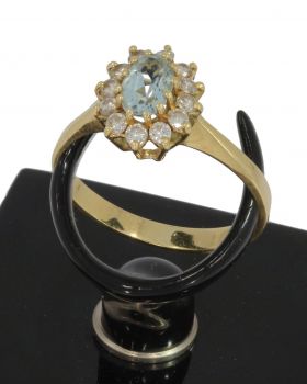 Aquamarijn met 12 diamanten rozet entourage ring 14k goud